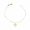 Pulseira pérolas com pingente de coração